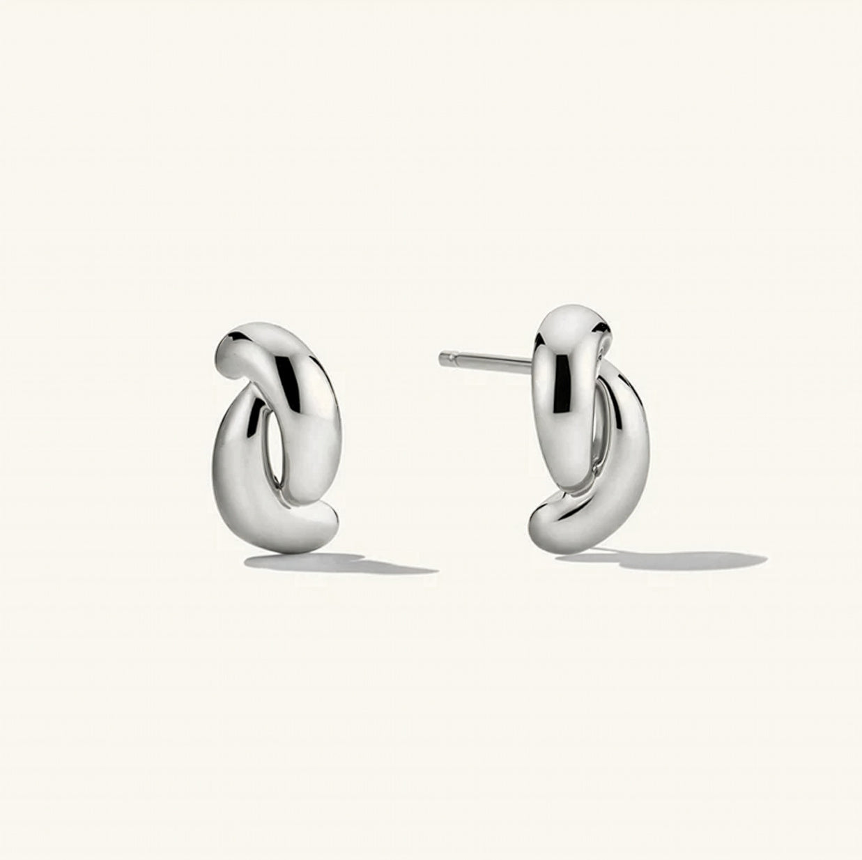 Сребърни минималистични обици с преплетен дизайн с родиево покритие