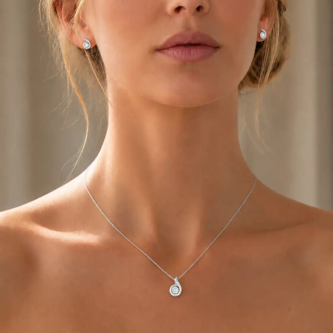 Silver earrings with sparkling zircons, minimalist design