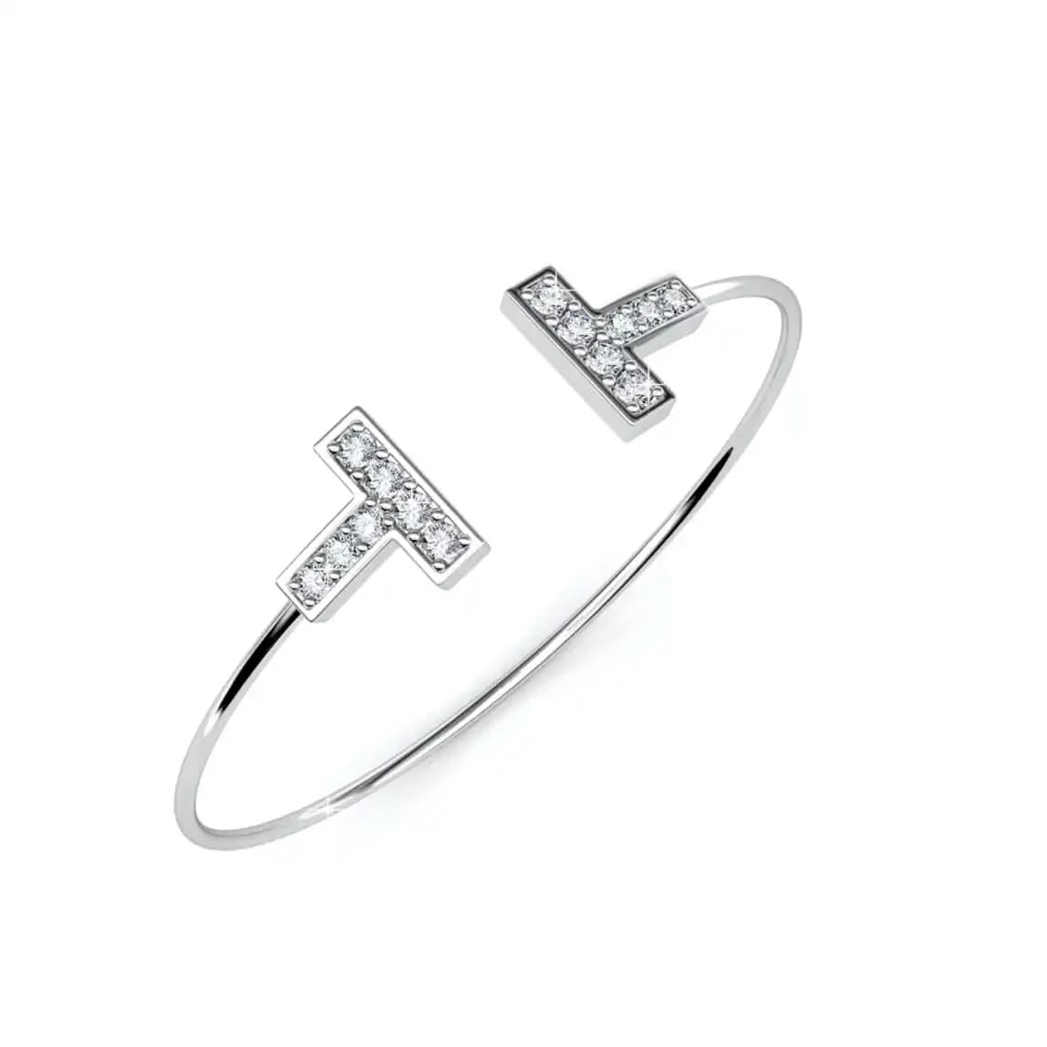 Изчистен дизайн гривна тип bangle с кристали Сваровски и 18К покритие бяло злато