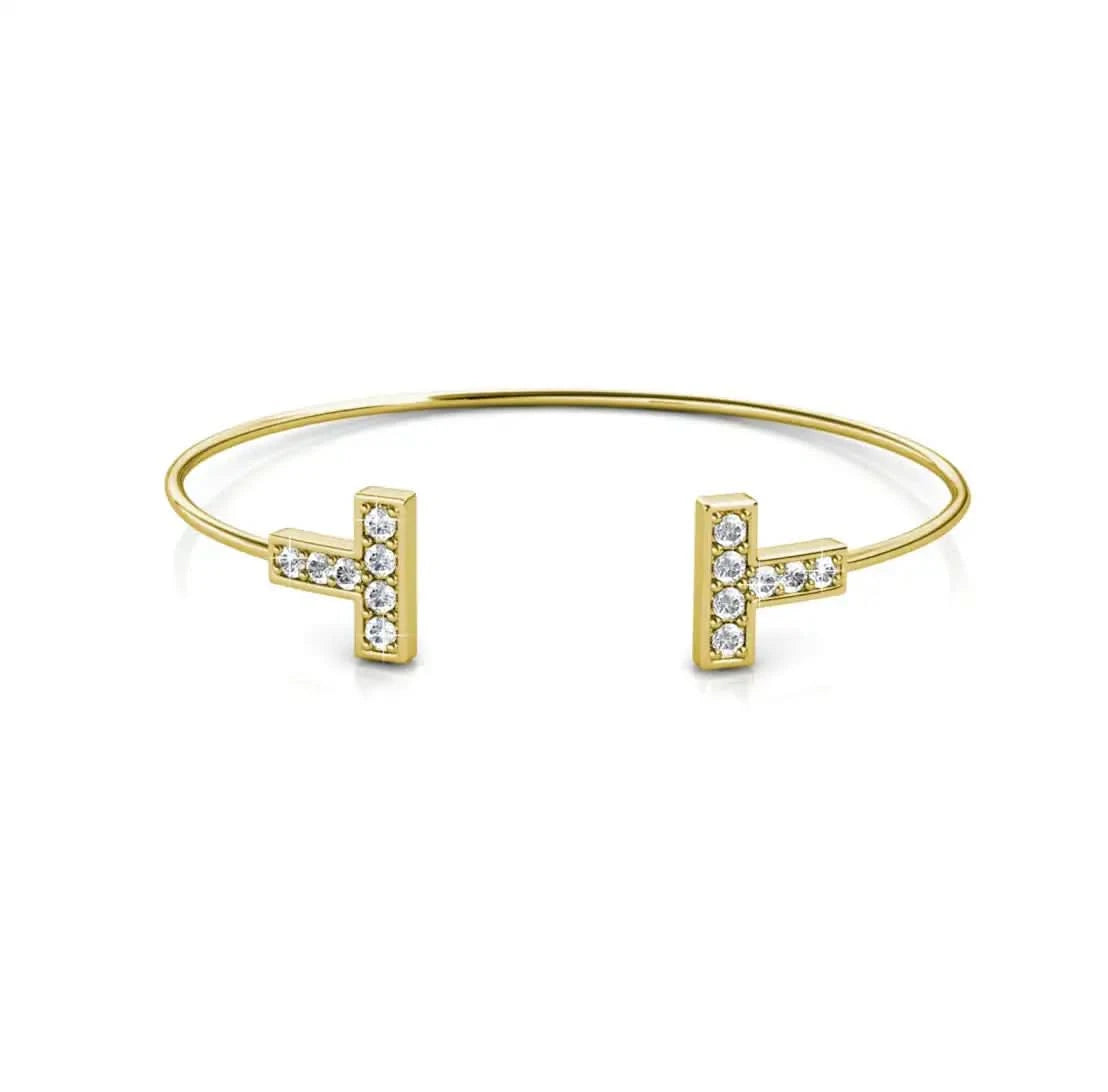 Изчистен дизайн гривна тип bangle с кристали Сваровски и 18К покритие злато